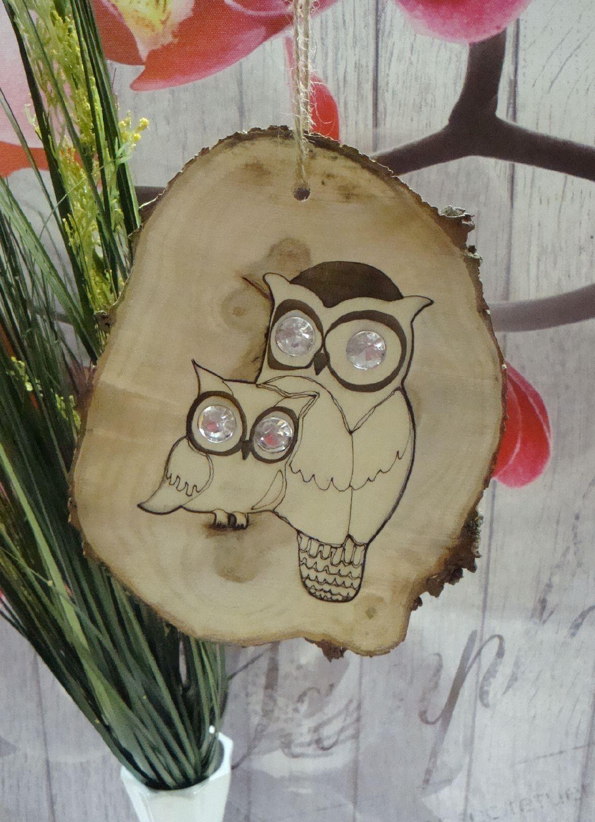 Eulenpaar in Astscheibe mit Swarovskisteinen