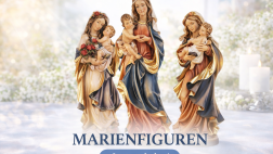 Marianfiguren im sonnigen Garten